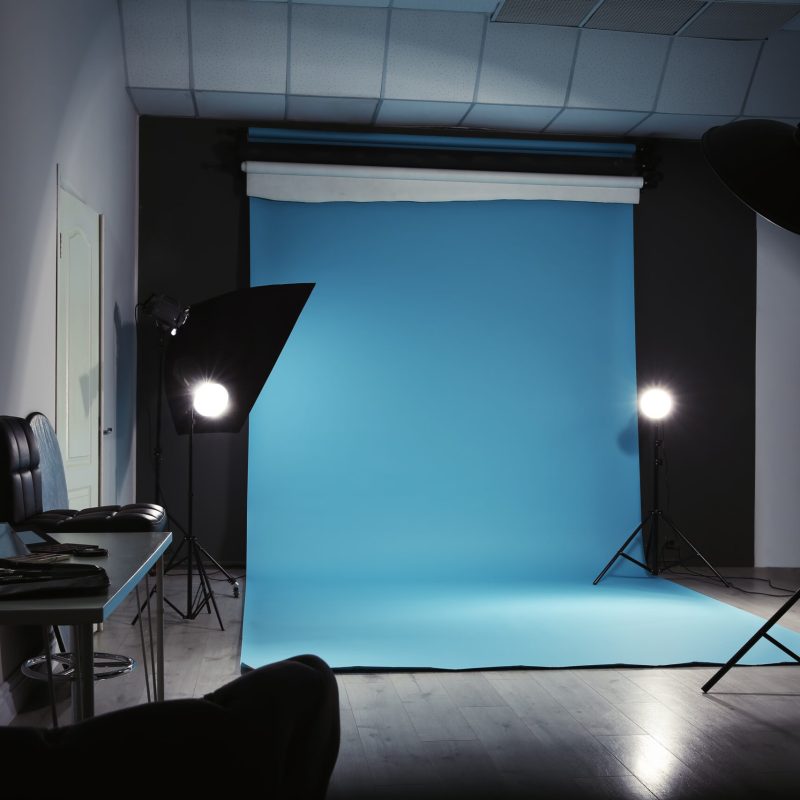 Modern photo studio interior with professional lighting equipment